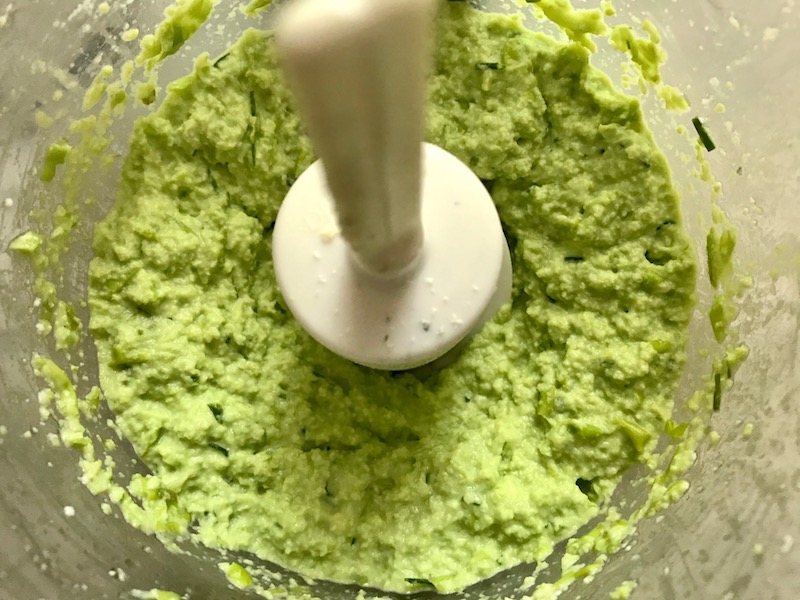 Edamame Dip blended in a food processor. It's creamy, savory, nutty, and utterly delicious!