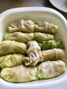 These Stuffed Cabbage Rolls (Golumpki!) are a great make-ahead family dish! This recipe uses ground chicken, paprika, parmesan, tomato paste, garlic, and onion for tons of flavor!