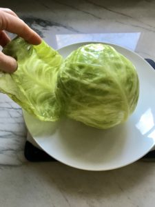 These Stuffed Cabbage Rolls (Golumpki!) are a great make-ahead family dish! This recipe uses ground chicken, paprika, parmesan, tomato paste, garlic, and onion for tons of flavor!