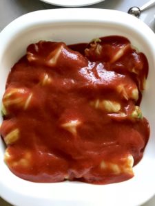 These Stuffed Cabbage Rolls (Golumpki!) are a great make-ahead family dish! This recipe uses ground chicken, paprika, parmesan, tomato paste, garlic, and onion for tons of flavor!