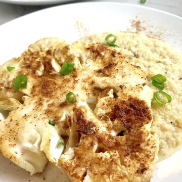 Since quinoa delivers protein, it’s a great opportunity to swap out meat for Cauliflower Steaks! These steaks can be grilled outside for an amazing meat alternative. This is a Creamy Parmesan Quinoa Mushroom Risotto recipe with garlic, parmesan, and mushrooms. Paired with the hearty Cauliflower steak spiced with Cumin, Chili Powder, and Garlic, this is the perfect meal!