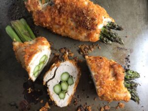 4-Ingredient DORITO CHICKEN and Asparagus Rolls! Yes, Doritos, my friend. The Doritos add a salty and crispy crust to the outside of the chicken with a hint of cheesy flavor. The Chicken stays moist and juicy rolled up and you get this fresh bite of Spring in the center with the Asparagus.