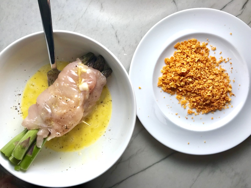 4-Ingredient DORITO CHICKEN and Asparagus Rolls! Yes, Doritos, my friend. The Doritos add a salty and crispy crust to the outside of the chicken with a hint of cheesy flavor. The Chicken stays moist and juicy rolled up and you get this fresh bite of Spring in the center with the Asparagus.