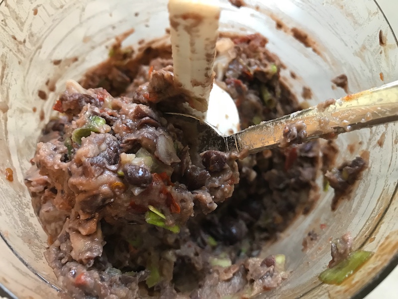 Blended black beans and scallions in food processor for Chipotle Meatballs with Mexican Corn Cream Sauce