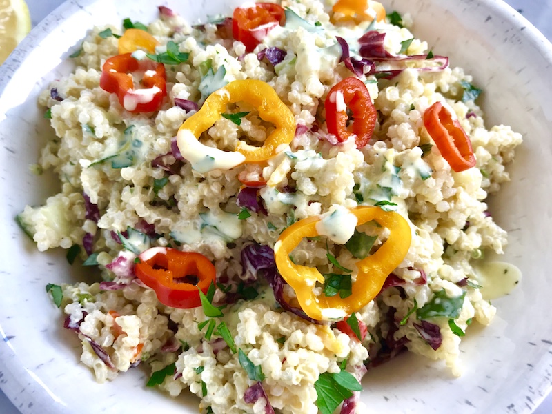 Veggie Quinoa Salad with Creamy Lemon Dressing is loaded with flavor, texture, color and is both delicious and nutritious! This Quinoa Veggie Salad has cucumber, sweet peppers, radicchio, scallions, and parsley. The dressing is a bright Creamy Lemon Dressing with Lemon, honey, mustard, and sour cream.