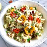 Veggie Quinoa Salad in a bowl with Creamy Lemon Dressing is loaded with flavor, texture, color and is both delicious and nutritious! The dressing is a bright Creamy Lemon Dressing with Lemon, honey, mustard, and sour cream.