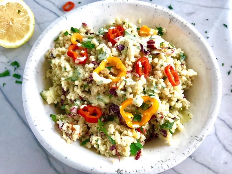 Veggie Quinoa Salad in a bowl with Creamy Lemon Dressing is loaded with flavor, texture, color and is both delicious and nutritious! The dressing is a bright Creamy Lemon Dressing with Lemon, honey, mustard, and sour cream.