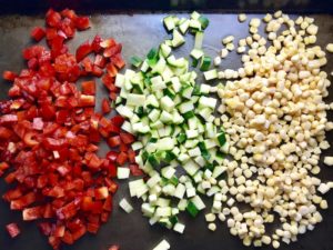 This 5-ingredient Sunny Quinoa with Fried Egg & Veggie Medley is simple, but incredible. The Veggie Medley is a trifecta of red pepper, zucchini, and sweet corn that are roasted on a sheet pan. Then on top of it all is a salty fried egg with a runny yoke that oozes out to bring a deep creaminess to the entire dish.