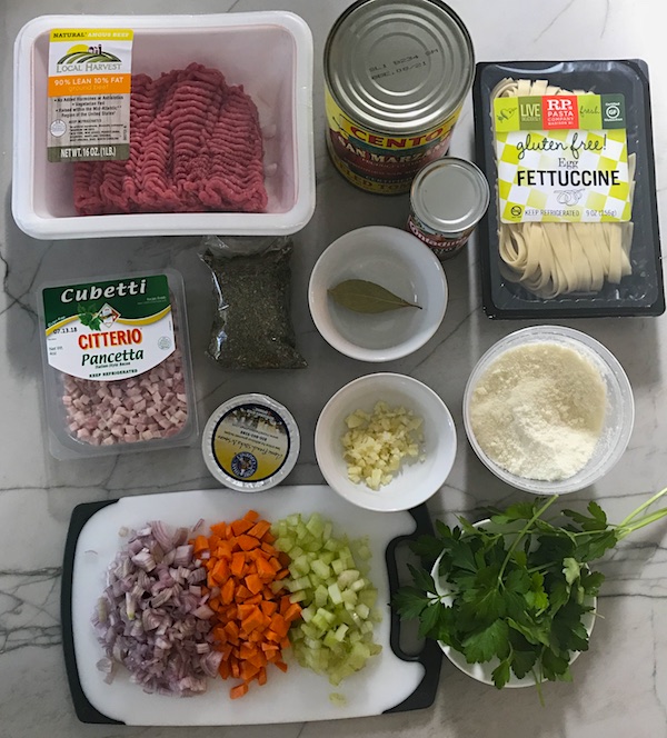 Anniversary Slow Cooker Beef Bolognese is a souped-up version of the traditional Italian Meat Sauce made EASY in the slow cooker! The flavors of the ingredients with the meat become one and turn into this amazing thick sauce. I add even MORE FLAVOR with Pancetta and Demi-Glace. Delicious!