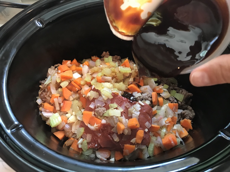 Anniversary Slow Cooker Beef Bolognese is a souped-up version of the traditional Italian Meat Sauce made EASY in the slow cooker! The flavors of the ingredients with the meat become one and turn into this amazing thick sauce. I add even MORE FLAVOR with Pancetta and Demi-Glace. Delicious!