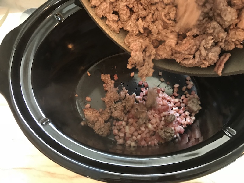 Anniversary Slow Cooker Beef Bolognese is a souped-up version of the traditional Italian Meat Sauce made EASY in the slow cooker! The flavors of the ingredients with the meat become one and turn into this amazing thick sauce. I add even MORE FLAVOR with Pancetta and Demi-Glace. Delicious!