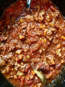 Anniversary Slow Cooker Beef Bolognese is a souped-up version of the traditional Italian Meat Sauce made EASY in the slow cooker! The flavors of the ingredients with the meat become one and turn into this amazing thick sauce. I add even MORE FLAVOR with Pancetta and Demi-Glace. Delicious!