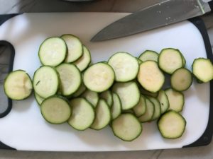 Vegetable Frittata with Lemon Crema is an easy weeknight dinner, quick breakfast, or weekend brunch recipe! This Vegetable Frittata is thick and hearty with lots of flavors and textures from the veggies, but is also light and creamy from the eggs and cheese. It's loaded with healthy veggies, is gluten free, and super EASY to make and to clean up after.