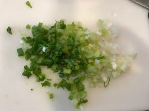 Finely sliced scallion for Roasted Red Pepper Gazpacho from talkingmeals.com