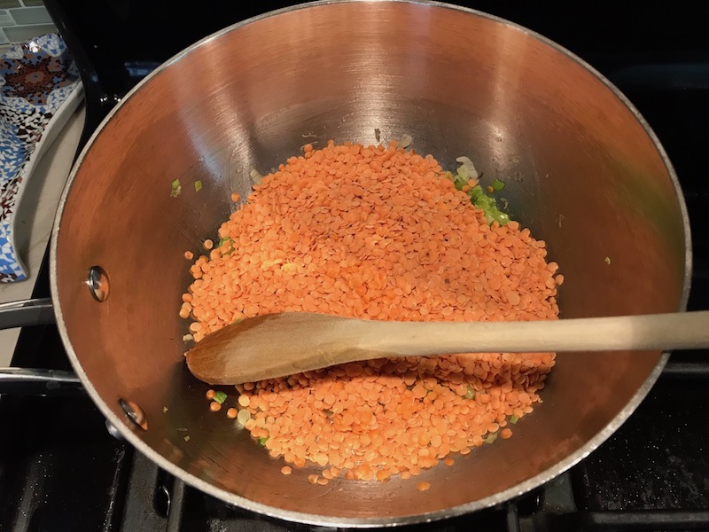 Lentils in pot for Korean Rice Bowl with Lentils and Cauliflower recipe, which is da bomb, exploding with flavor! The rice soaks up the sauce, which gives you a nutty, salty flavor from sesame oil and soy sauce, a warm and zesty kick from ginger and garlic, and sweetness from honey to balance it all out. Lentils and cauliflower give a meaty bite.