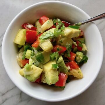 Fresh, bright, sweet, creamy, crunchy, and bursting with flavor, this Zippy Pineapple Salsa has red pepper, jalapeño, cilantro, scallion, lime, and avocado. It's the perfect topping for just about anything grilled. It's also just perfect for eating with chips or as a salad on it's own!