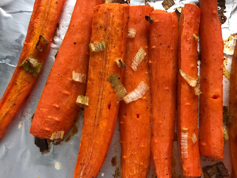 Roasted Carrots with smoky cumin and scallions, then topped with Avocado Crema are such a delicious and quick side dish for dinner. Roasting brings out the natural sugar in the carrots, so they get a sweet caramelization with the salty and smoky flavors. The Avocado crema gives creamy and silky balance.