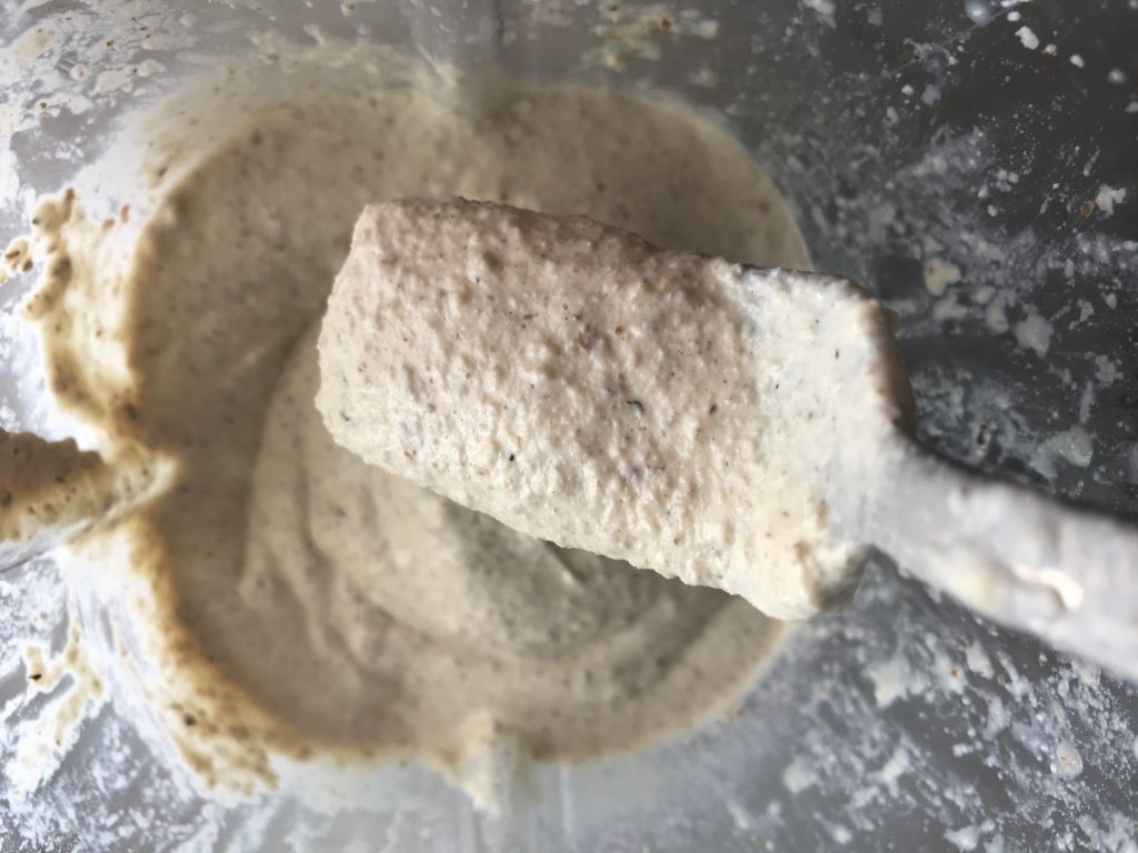 Walnut Cream Sauce blended in the blender with fork showing it up close. This Walnut Sauce recipe with Ricotta and Spinach is thick, rich, nutty, and creamy. It's inspired by the traditional Italian Walnut Sauce from the North-Western Italy, Liguria Region, but my Walnut Sauce recipe adds even more decadence with creamy ricotta and more nutty parmesan cheese.