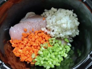 Ingredients in slow cooker for Chicken and Mushroom Soup in the Slow Cooker