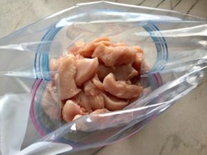 Cut chicken added to freezer bag. This Freezer Hoisin Chicken with Red Peppers, Carrots, Onions, Ginger, and Soy sauce is delicious and so easy to make. You get sweet and savory all in one dish and it's perfect for kids because it's sweet, not spicy at all. Just freeze ahead, thaw, then cook on a sheet pan!