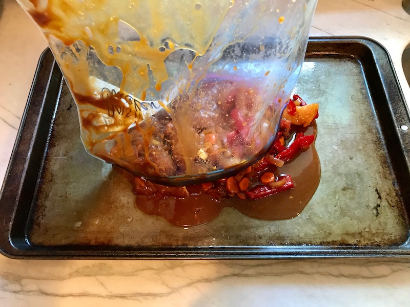 Add the entire bag to a Sheet Pan.This Freezer Hoisin Chicken with Red Peppers, Carrots, Onions, Ginger, and Soy sauce is delicious and so easy to make. You get sweet and savory all in one dish and it's perfect for kids because it's sweet, not spicy at all. Just freeze ahead, thaw, then cook on a sheet pan!