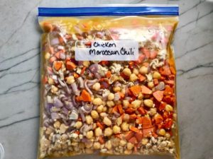 Final labeled freezer bag of all ingredients for Moroccan Chicken Chili with Chickpeas is loaded with comforting and healthy ingredients and spices. You get warmth from Ginger, Turmeric, Garlic, and Coriander. Then tons of hearty flavor from browned ground chicken and Shallots. And creaminess from the Carrots and Chickpeas. You can make it ahead and freeze it until you are ready to cook it!