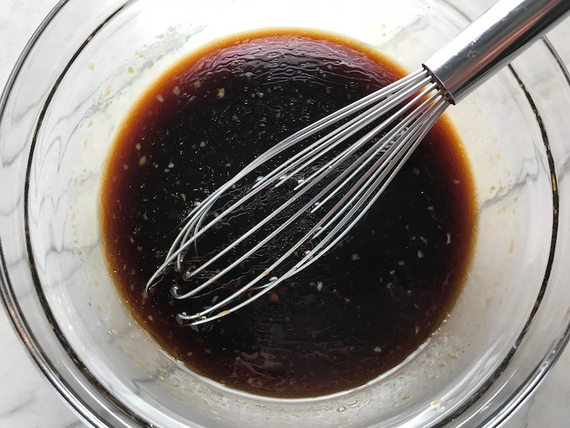 Mixed Soy Sauce for Asian Lettuce Wraps. They are a fantastic way to use leftover Turkey or Chicken transforming it with new delicious flavors and textures. The turkey is stir fried with carrots, red pepper, and brussel sprouts in a flavorful ginger, garlic, & sesame sauce. It's layered in lettuce wraps with rice and a cool, crunchy purple cabbage sesame slaw. Serve with a Garlic Honey Soy Sauce....YUM!!!