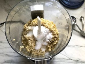 Quinoa Crust ingredients for the Tomato Tart Recipe. It gives you crunch from the Quinoa crust, a burst of fresh from the tomatoes, tons of flavor from the basil and garlic, tang and meatiness from the artichoke and so much creaminess from the mozzarella and goat cheese! It's addictive and delicious!