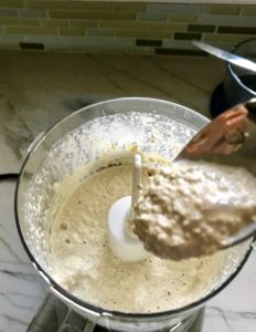 Quinoa Crust ingredients blended in food processor for the Tomato Tart Recipe. It gives you crunch from the Quinoa crust, a burst of fresh from the tomatoes, tons of flavor from the basil and garlic, tang and meatiness from the artichoke and so much creaminess from the mozzarella and goat cheese! It's addictive and delicious!