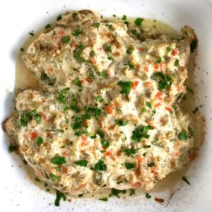 Creamy Olive Chicken cooked in a casserole dish. This is magnificently thick and creamy and infused with garlic flavor and nuttiness from the Parmesan. The best part; however, is the salty and briny flavor kick from the green olives with a little sweetness from the pimiento. #chicken #chickenrecipes #chickendinner #easydinners #easyrecipes #comfortfood #casserole