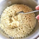 Cooked quinoa in pot.
