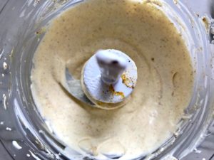 Curry Dressing blended in food processor for Curry Chicken Salad. It has so many fantastic flavors and textures! The chicken breast is simply roasted and mixed with a creamy sweet and savory curry dressing. Red pepper gives you a fresh crunch, scallion gives a savory bite, and raisins give a burst of sweet. #chicken #chickenrecipes #chickensalad #currychicken #mealprep #lunch #healthyrecipes