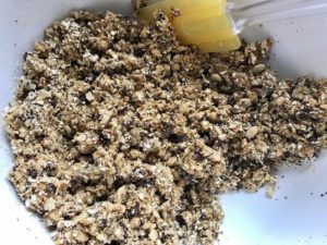 All ingredients mixed in bowl for No Bake Energy Bites. These Easy Nut-Free, No-Bake Energy Bites with Chocolate Chips are magnificent! They are sweet, chewy, crunchy, & healthy. Only minutes to make & no Baking! Breakfast, snack, or dessert. #energybars #granolabars #snackrecipes #healthyfood #healthyrecipes #healthysnacks #healthybreakfast #healthydessert