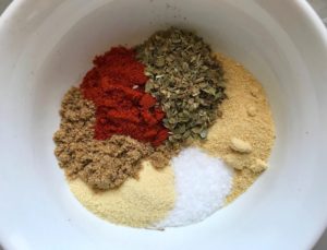 Spices in bowl for Roasted Tofu Croutons. These are seasoned and toasted for the perfect addition to any salad, pasta, rice, or soup! They get a roasted, almost nutty flavor with a salty and smoky seasoned crust with a chewy bite. Super easy to make, low carb and great source of protein! #croutons #salad #tofu #tofurecipes #vegetarian #plantbased #paleo