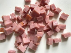 Diced Ham for Cauliflower Cordon Bleu Bake recipe. It layers in nutty and salty Gruyere Cheese, with a creamy Vegetable broth based sauce with garlic and parsley. Then the ham and cauliflower are folded into all of this goodness and it's baked in the oven until it all becomes one knock-your-socks-off dish! #cauliflower #lowcarb #glutenfree #casserole #onepot #familydinner #mealprep #easydinner #dinner #healthydinner #healthyfood #healthyrecipes