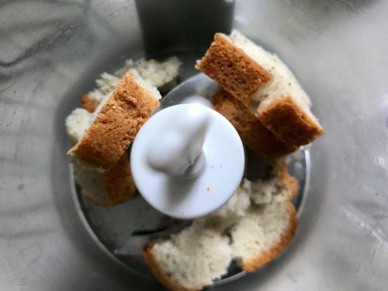 bread pieces in food processor for Cauliflower Cordon Bleu Bake recipe. It layers in nutty and salty Gruyere Cheese, with a creamy Vegetable broth based sauce with garlic and parsley. Then the ham and cauliflower are folded into all of this goodness and it's baked in the oven until it all becomes one knock-your-socks-off dish! #cauliflower #lowcarb #glutenfree #casserole #onepot #familydinner #mealprep #easydinner #dinner #healthydinner #healthyfood #healthyrecipes