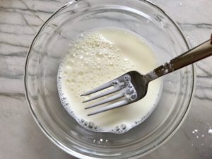 Cornstarch in milk for Spinach Artichoke Stuffed Zucchini. Each fantastic bite gives you creamy artichoke, nutty cheesy Parmesan, spinach, and zucchini. Prepare entirely ahead, then bake 20 minutes and enjoy! #vegetarian #zucchini #stuffedzuchini #spinach #artichoke #springrecipes #healthyfood #healthydinner #healthyrecipes #glutenfree