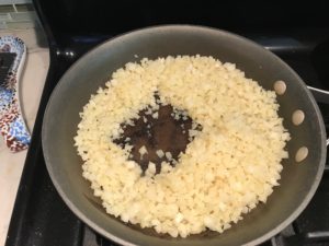 Cauliflower Chopped and cooked in a large skillet for Meatballs in Cauliflower Dill Cream Sauce. The cauliflower sauce with garlic, fresh dill, cream cheese, and tomato paste. #meatballs #swedishmeatballs #familydinner #easydinner #dinner #healthydinner