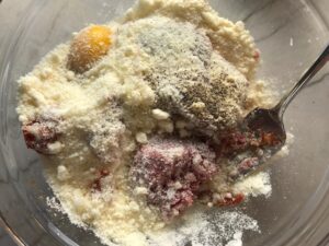 Ingredients in bowl for Mini Meatloaf Muffins. They have only 5 simple ingredients, cook in 30 minutes, and are gluten free.