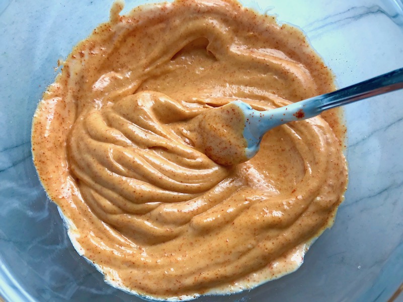 Mixed Paprika Aioli for Patatas Bravas with chorizo and creamy Paprika aioli. This Patatas Bravas Recipe, or Spicy Potatoes, is easy, indulgent, and utterly delicious! #potatorecipes #potatoes #potatosidedishes #patatasbravas #skilletpotatoes #sidedishes #chorizo