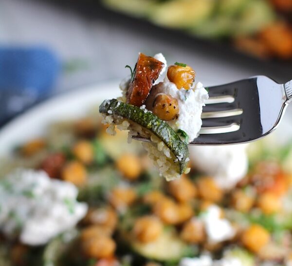 For with bite of zucchini, chickpeas, sausage, and ricotta. Mediterranean SHEET PAN DINNER has hearty and satisfying chicken sausage, creamy and bright zucchini. and crispy nutty chickpeas. Serve over quinoa with a few dollops of seasoned Ricotta. #sheetpandinner #chickpeas