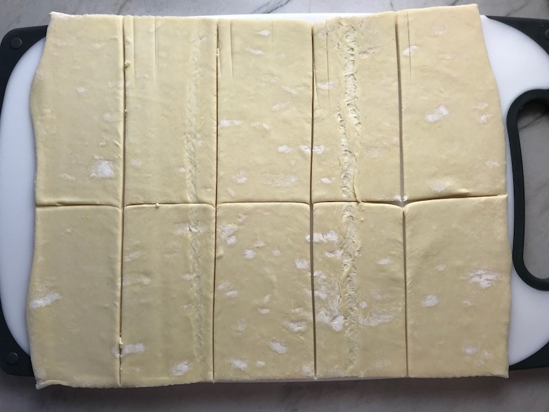 Puff Pastry sheet cut into 10 pieces for Mini Beef Wellington Bites. They are flaky and buttery Puff Pastry is filled with a creamy mushroom and parmesan filling and tender beef filet. #appetizers #partyfood