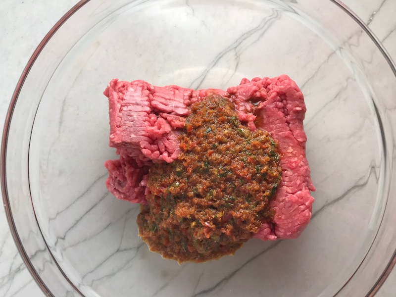 Raw beef and blended ingredients in bowl for Teriyaki Meatballs with Veggie Stir Fry, and rice noodles. #asianmeatballs #teriyaki #noodles #familydinner #easydinners #dinnerideas