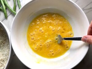 Making Parmesan Green Bean Fries