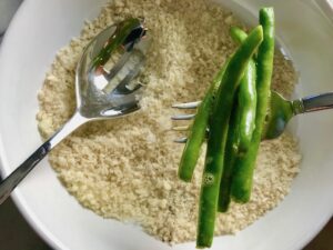 Making Parmesan Green Bean Fries