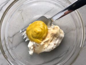 Mustard and mayo in bowl for Sauce for Crispy Parmesan Green Bean Fries! Such a great way to transform beans and add a new vegetable into dinner rotation. #vegetablerecipes