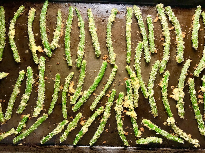 Crispy Parmesan Green Bean Fries cooked on sheetpan! Such a great way to transform beans and add a new vegetable into dinner rotation. #vegetablerecipes