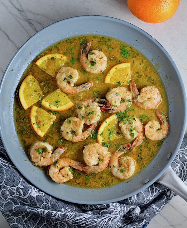 Orange Brown Butter Shrimp Pasta Recipe on a plate. It has a silky sauce that's buttery, nutty, and slightly sweet!