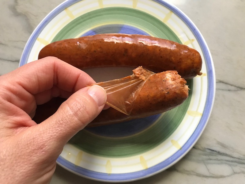 Remove casing from chorizo for Cottage Pie recipe. It has Spanish Chorizo and ground beef cooked in a rich and savory gravy with veggies and herbs. Creamy mashed potatoes sit on top with manchego, parmesan, and garlic. #dinnerideas #cottagepie #shepherdspie