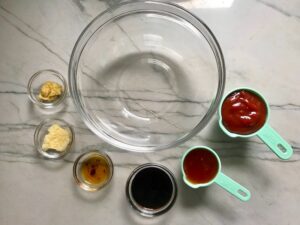 Ingredients in bowls for Chinese BBQ Sauce for Pork Tenderloin. It's sweet, tangy, salty, and all together lick-your-fingers delicious! It's also easy to make! #chinesebbqsauce #bbq #bbqsauce